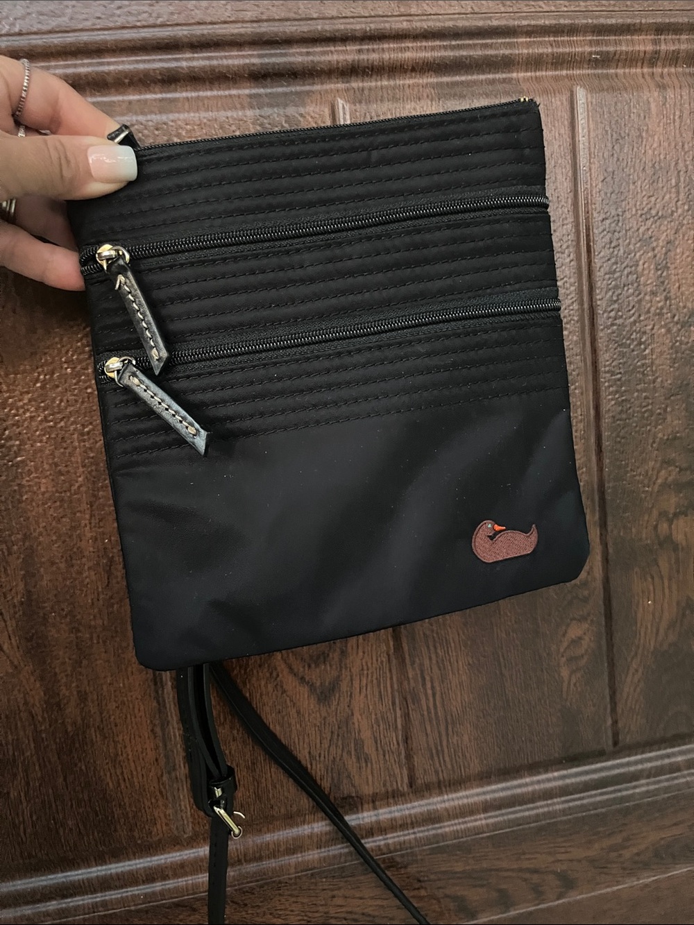 Dooney & Bourke Black Crossbody Organizer Bag with Whale Patch